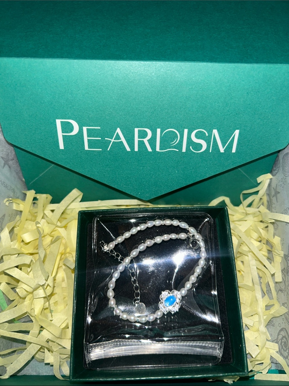 Pearl White Bracelet with Blue Heart Charm by Pearl